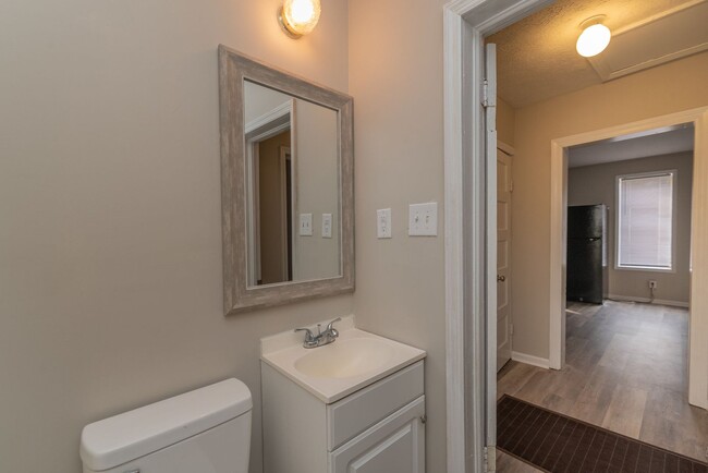 Building Photo - Brick home with a fenced-in yard!