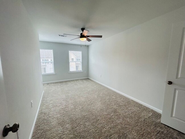 Building Photo - Applications pending! Stunning new end-unit 3 bedroom 2.5 bath townhouse in N High Point with att...
