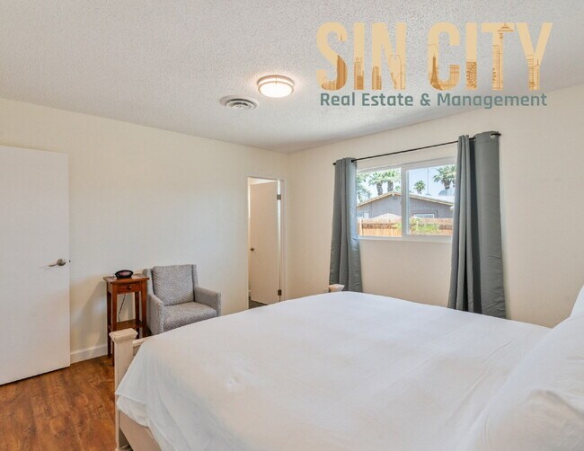 Building Photo - "Charming 4-Bedroom Retreat in Las Vegas –...
