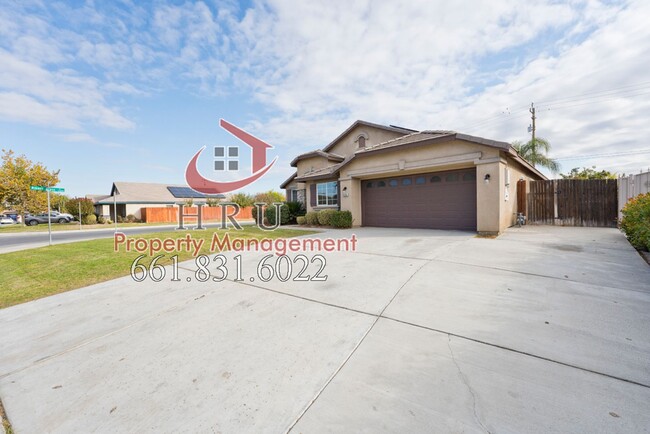 Building Photo - SW-Bakersfield  features 4 bed 2 bath with...