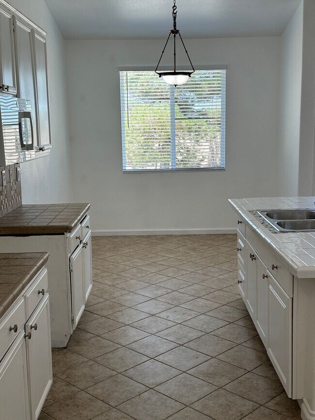 Building Photo - Spacious 4-Bedroom Home with Office, 3 Full Baths, and Modern Amenities