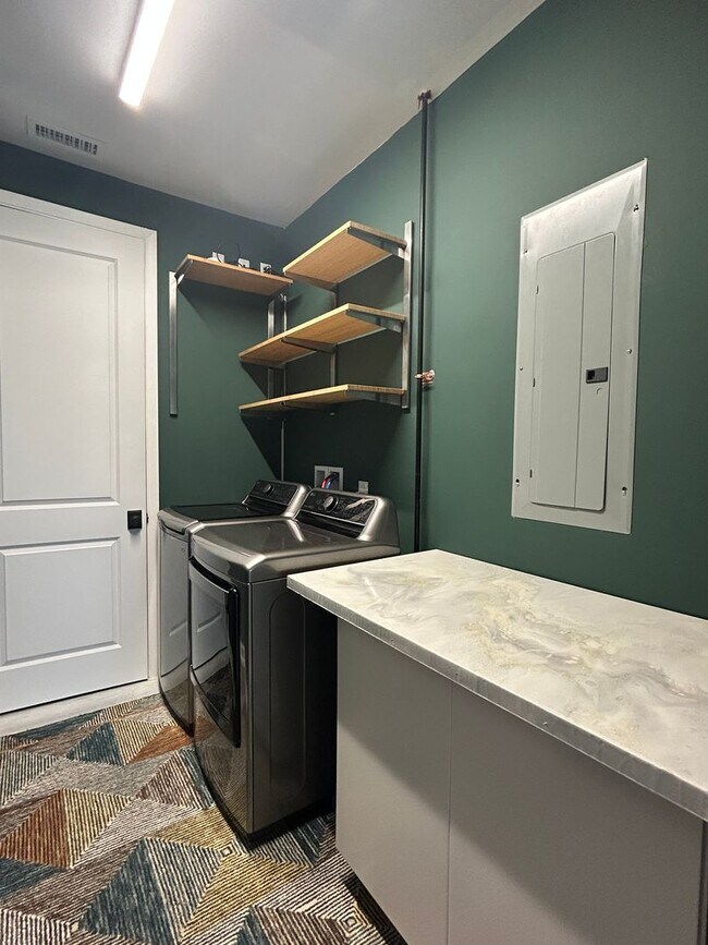 Building Photo - Industrial Style. Downtown Energy. Elevated Living.