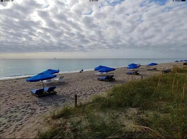 Nothing to carry to the beach. Rental lounges for convenience. - 6520 N Ocean Blvd