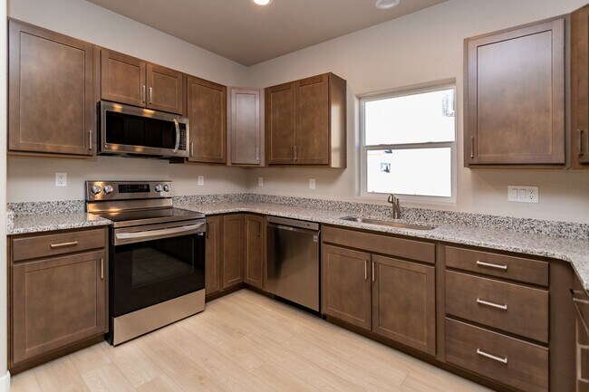 Building Photo - Unveiling Luxury Living: Townhomes with Ma...