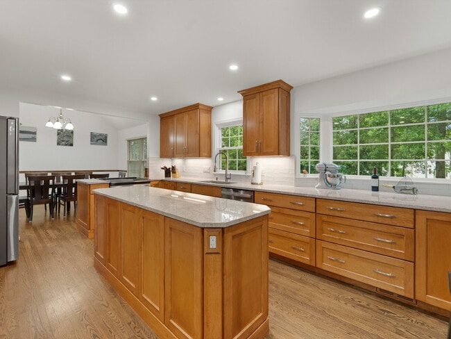 Building Photo - "Stunning 4-Bed Gem with Finished Basement...