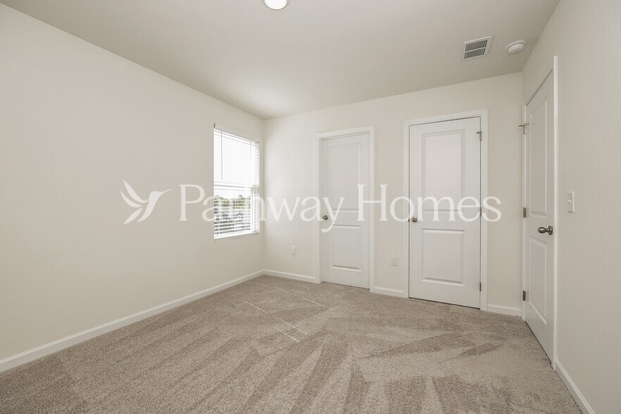 Building Photo - 202 Wild Daisy Wy
