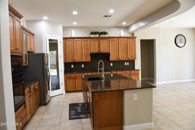 Building Photo - 9539 W Harmony Ln