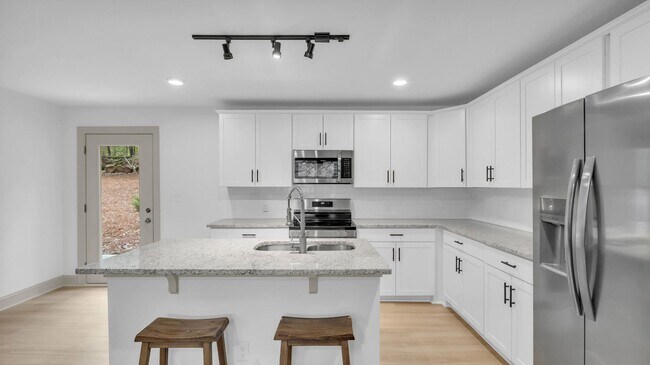 Building Photo - Retreat Like Feel + Practically New! 4 Beds, 3 Baths, Over 2,000 Sq Ft. with Glimpses of Nickajac...