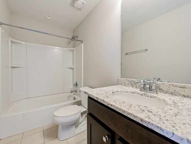 Building Photo - AVAILABLE NOW! Stunning 5-Bedroom Home in ...