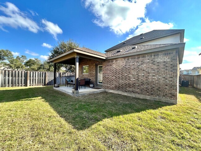 Building Photo - Inviting 4-Bed, 2.5-Bath Home with High Ceilings and Covered Deck