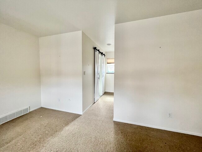 Second Master Bedroom showing hallway to walk-in closet and bathroom - 3268 S Oneida Way