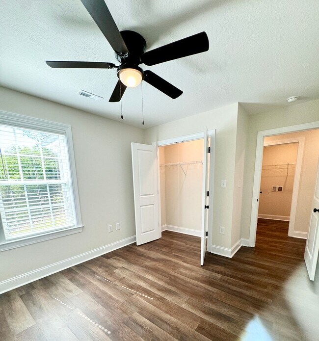 Building Photo - BEAUTIFUL pond front home! All the details make this a showstopper.! Fenced Yard!!