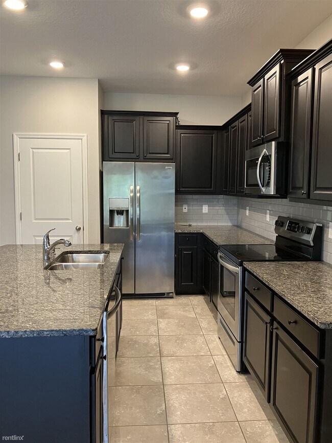 Building Photo - 3 br, 2.5 bath Townhome - 2531 Midnight Pe...