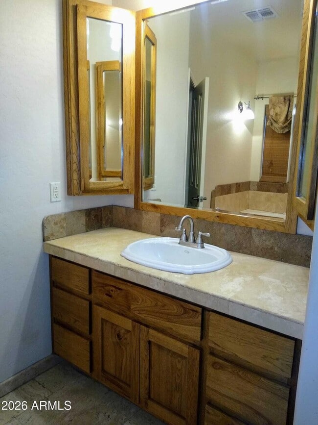 Building Photo - 242 N Pima Rd