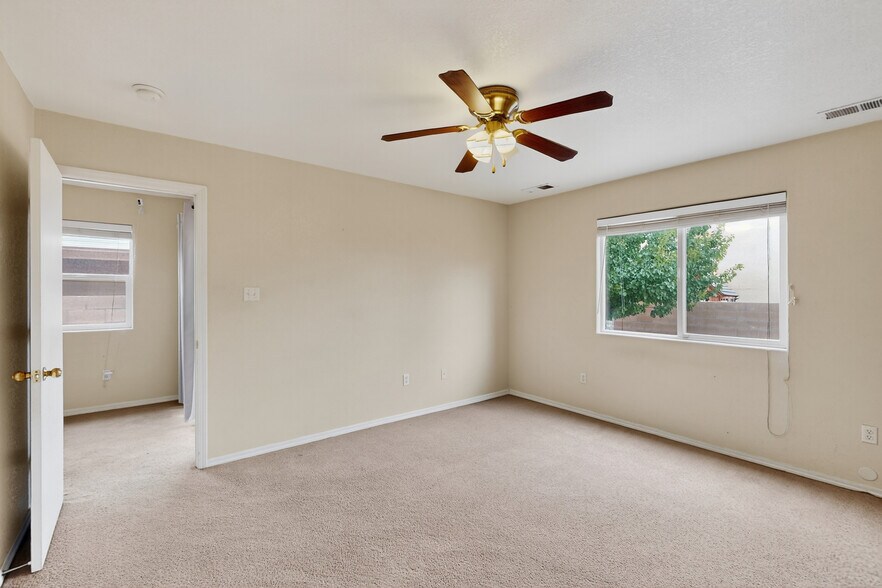 Building Photo - 9000 Violet Orchid Trl SW