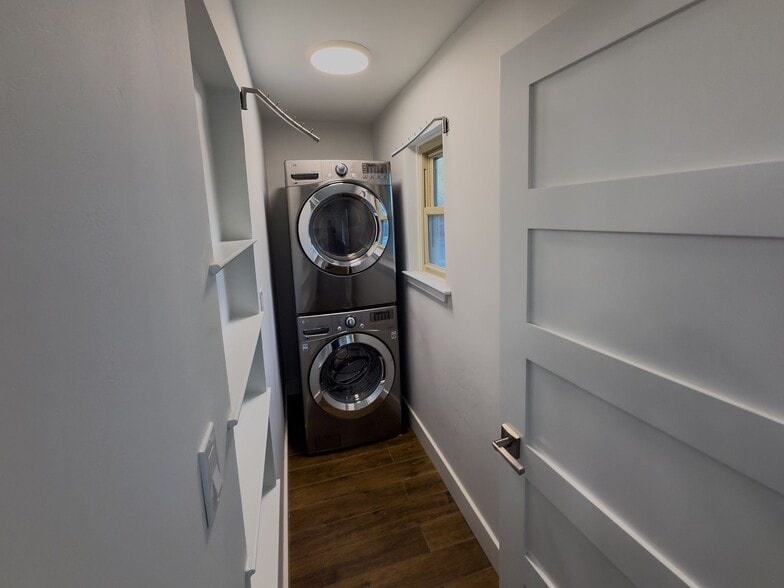 Stacked washer and dryer in dedicated laundry area - 2006 Candle Ct