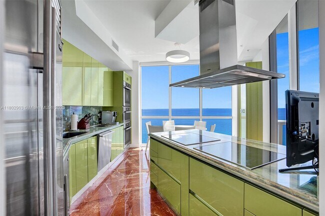 Building Photo - 18201 Collins Ave