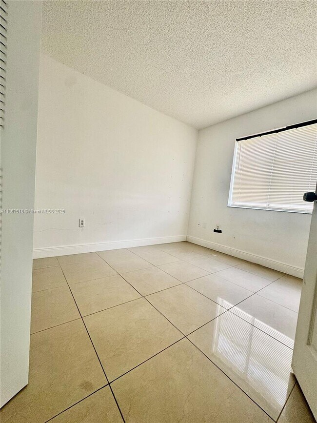 Building Photo - 14570 SW 145th Pl