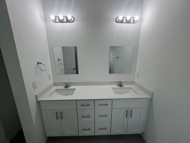 Building Photo - Brand-New 4BR/2BA Luxury Home with 2-Car Garage – Desirable 33971 Location