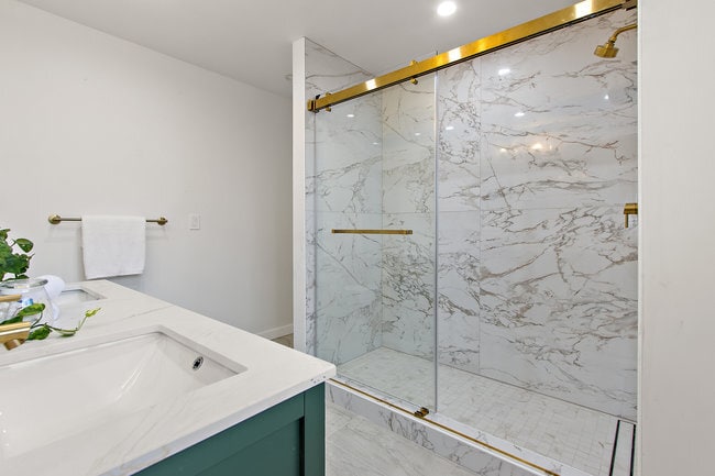 remodeled primary bath, marbile like tile - 3600 Klamath St