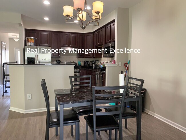 Building Photo - Gorgeous End-Unit TH In Desired Cary Locat...