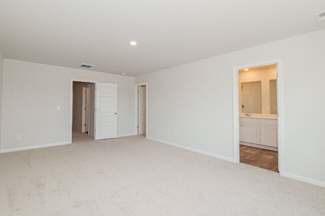 Building Photo - Brand-new 3 bedroom, 2.5 Bath Townhome with pond view