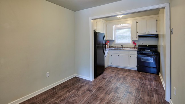 Upgraded Kitchen Opens to Dining and Living Areas - The Sterling