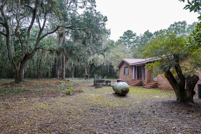 Building Photo - Tucked Away Three Bedroom Home