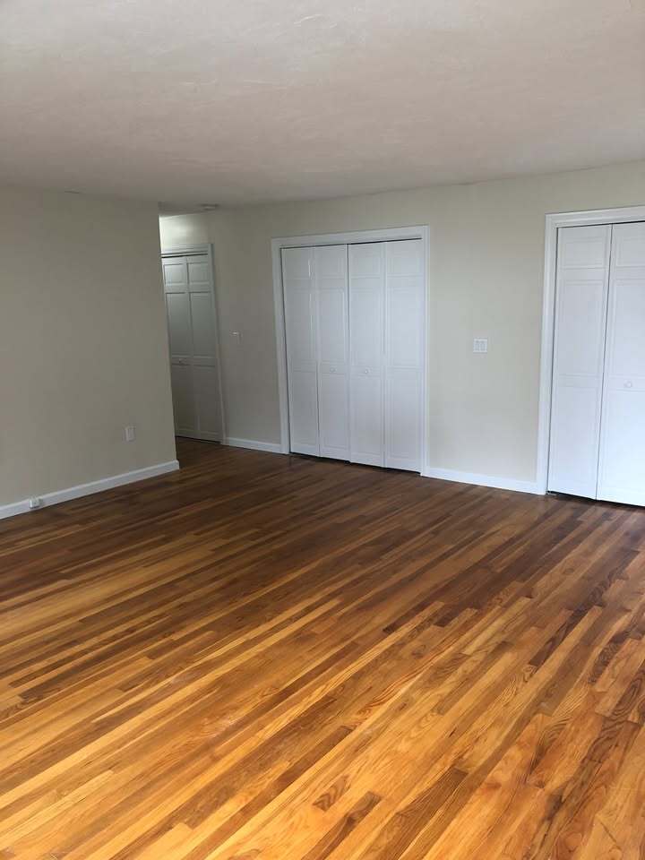 Primary bedroom with 3 large cedar closets - 89 Congress St