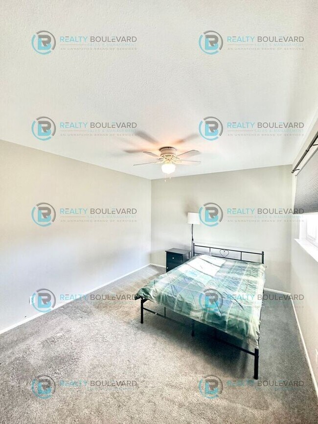 Building Photo - 2-bed, 2-bath, 2-story townhome with pool and park like setting outside the front door.