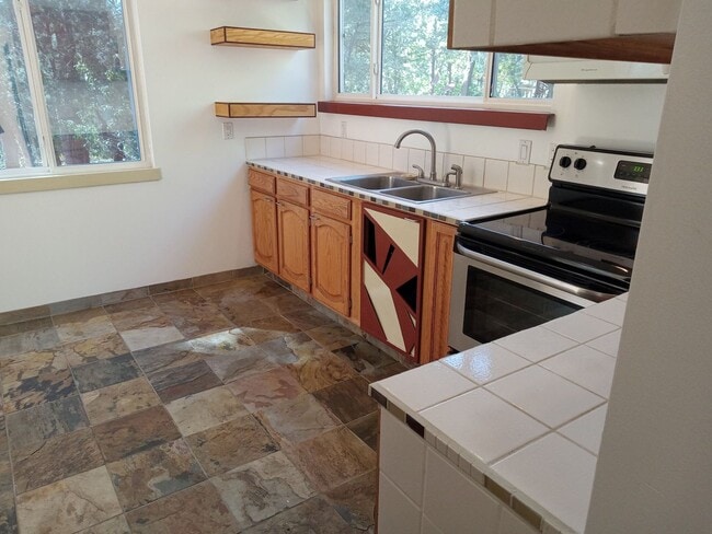 Building Photo - COZY HOME IN THE BEAUTIFUL TOWN OF TIJERAS | Showings available NOW!!