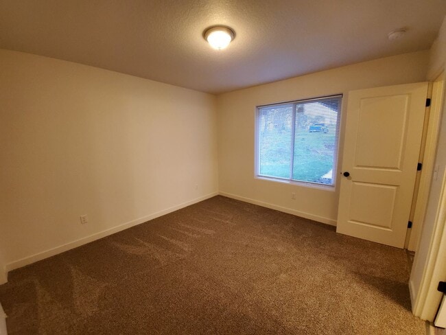 Building Photo - Adorable Newer Home in a Great Location With A Private Yard!