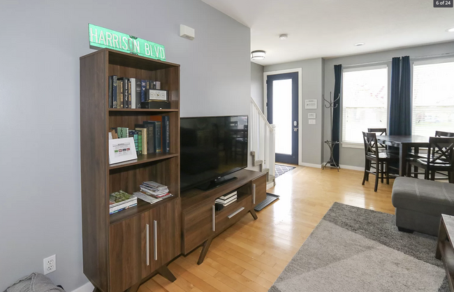 Living room welcomes renters to display their entertainment devices for everyone's enjoyment - 584 N 8th W