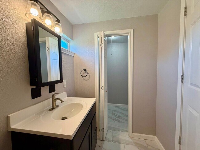 Building Photo - Fully Renovated 3-Bedroom Corner Home with Private Yard & 2-Car Garage