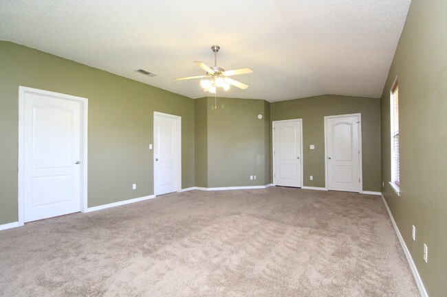 Building Photo - Executive 3-Bedroom Brick Home with Florid...