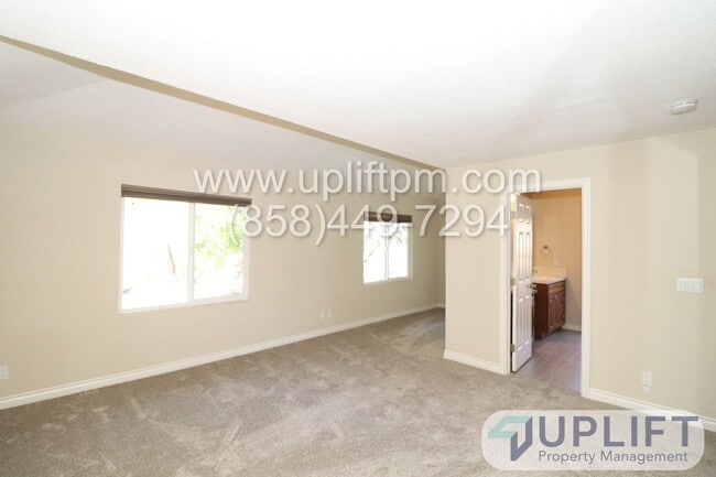 Building Photo - 4 Bedroom 2 Bathroom with Garage and Green...
