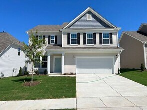 Building Photo - LIKE NEW 4 Bedroom Home w/ Ground Floor Bedroom