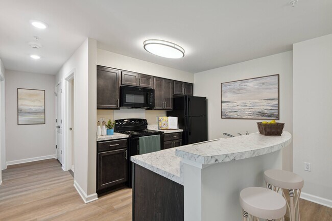 Building Photo - The Village at Slippery Hill Senior Apartments- 62+