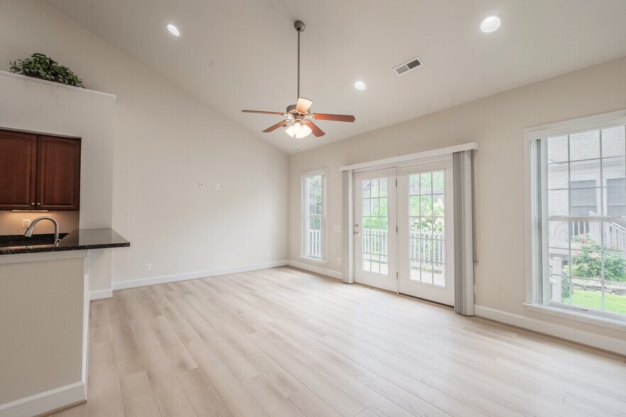 FAMILY ROOM WITH VAULTED CEILING - 8934 Yellow Daisy Pl