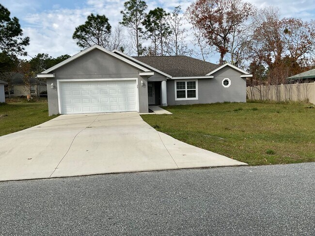 Building Photo - Custom Home - Desirable SE Ocala Neighborhood 3/2/2 **Won't Last**