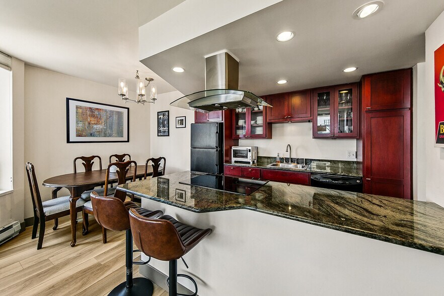 Kitchen with separate dining area, and a breakfast bar - 2201 3rd Ave