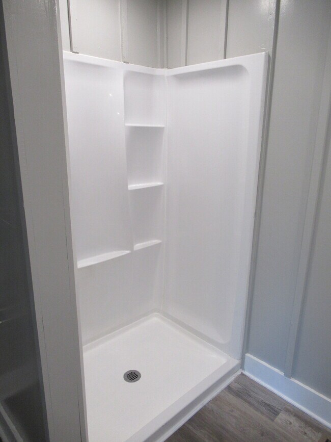 Building Photo - Check out this beautifully renovated white...