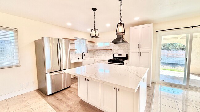 Building Photo - Wonderful Single-Story Home with Remodeled Kitchen and Baths, Fresh Paint, and Minutes to downtow...