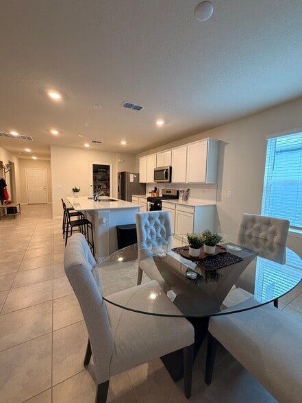 Dining area. - 3438 Orange Rose Loop