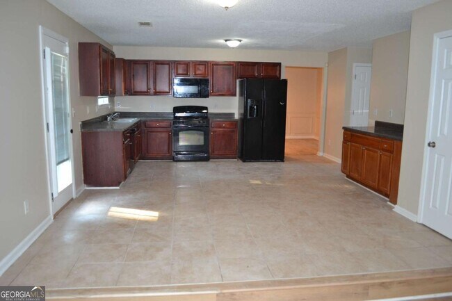 Building Photo - 6157 Red Top Loop