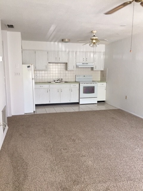 Building Photo - 55+, quaint 2/1 in a gated community locat...