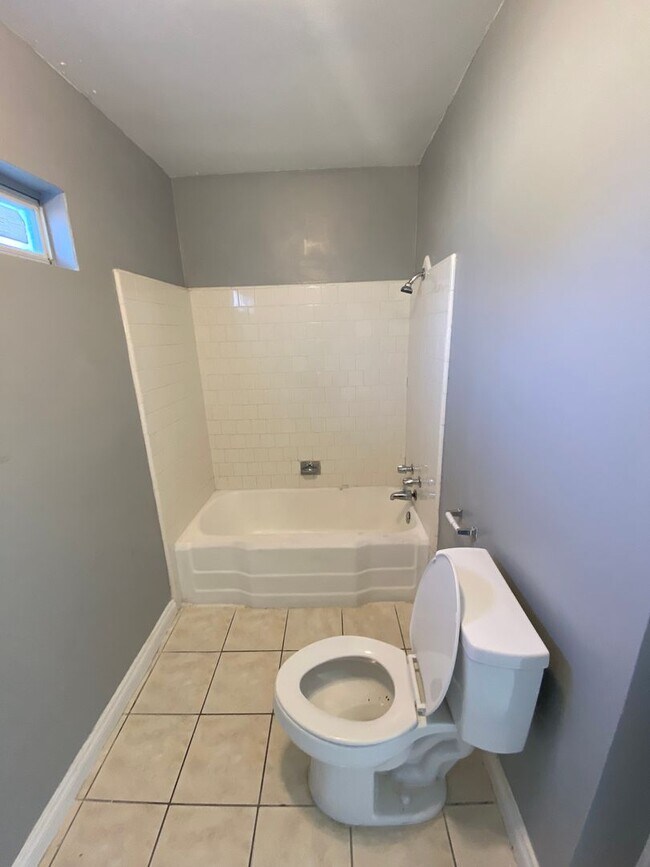 Building Photo - Hard to Find 1 BD 1 BA House with a 2 car garage and it's own yard.