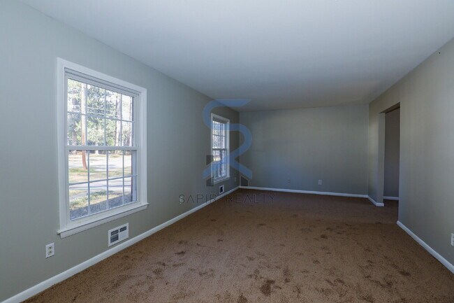 Building Photo - Move in before January 31st and choose your reward: a $250 Amazon Gift Card or a 55" Smart TV!