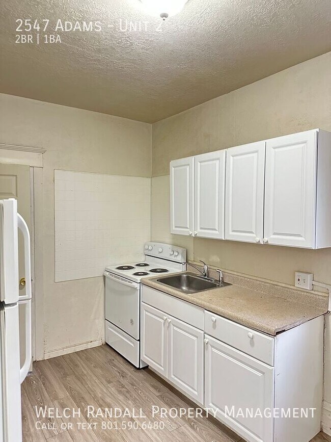 Building Photo - 2547 Adams-Unit 2