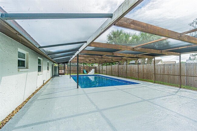 Building Photo - 6321 Spanish Main Dr